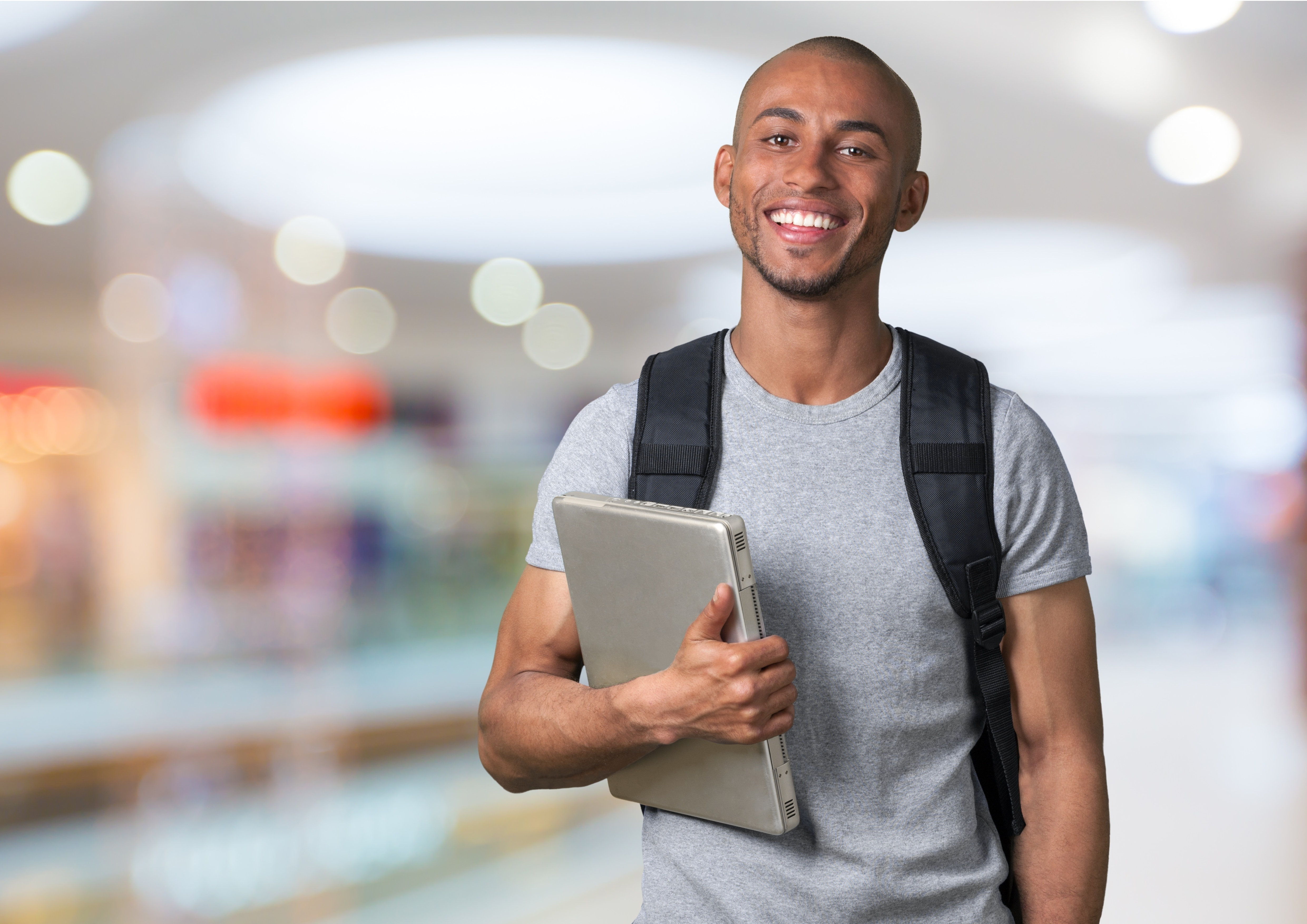 An image of a smiling male student