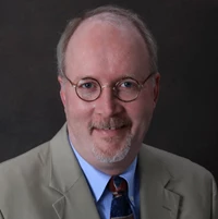 A portrait of Dr George Steele