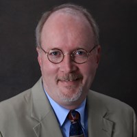 A portrait of Dr George Steele